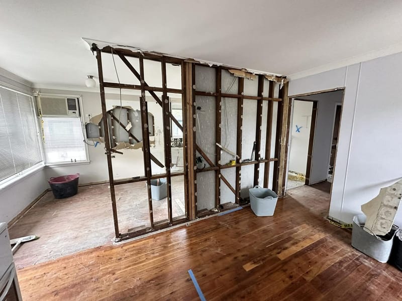 Wall stripped back to the timber frame during a home renovation by ASP Build & Co, Adelaide