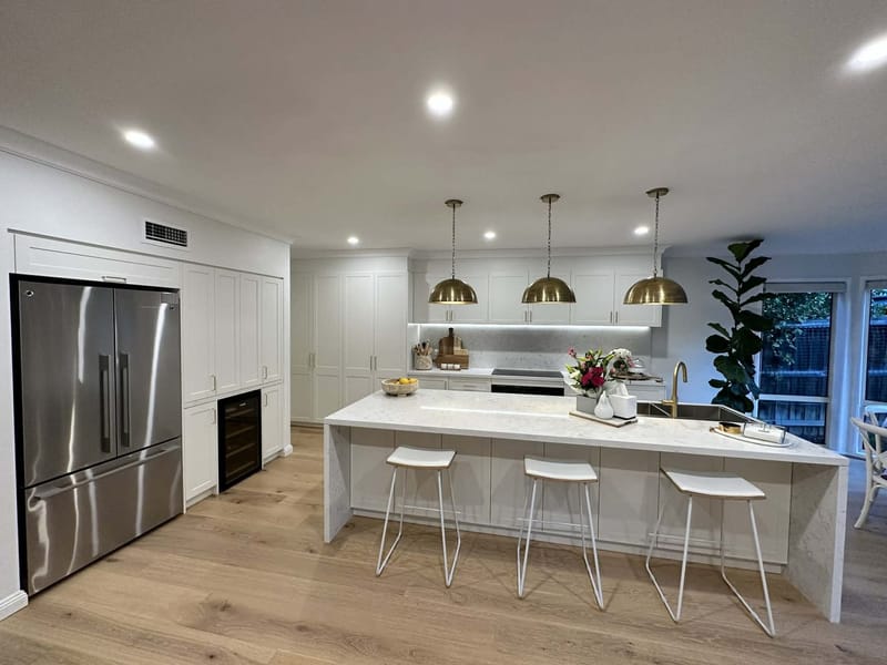 Renovated kitchen with stone benchtop by ASP Build & Co, Munno Para