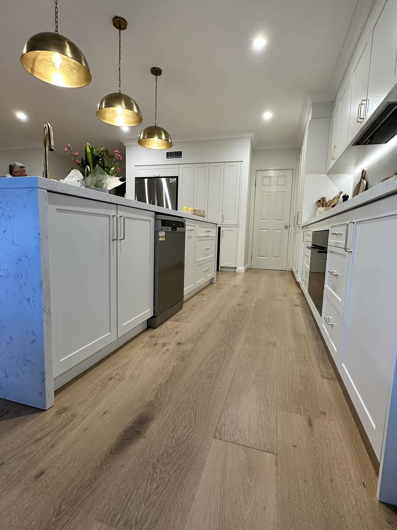 Kitchen makeover with feature lighting and custom cabinetry — ASP Build & Co