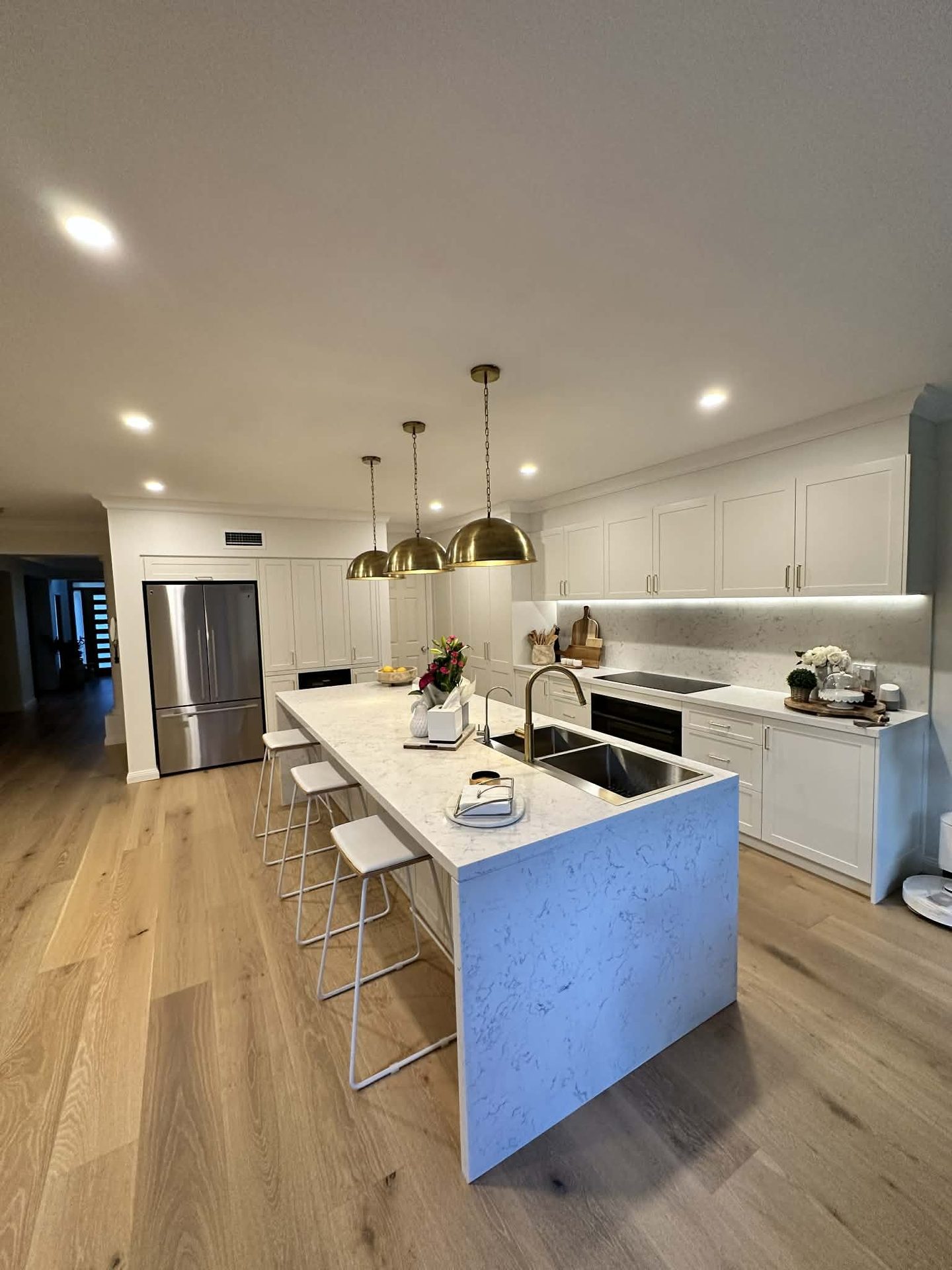 Renovated kitchen in a mid-century home by ASP Build & Co near Elizabeth
