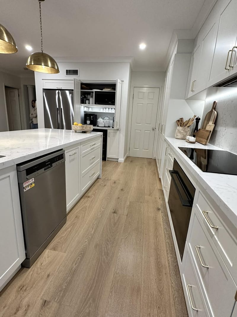 Waterfall island bench in a renovated Adelaide kitchen by ASP Build & Co