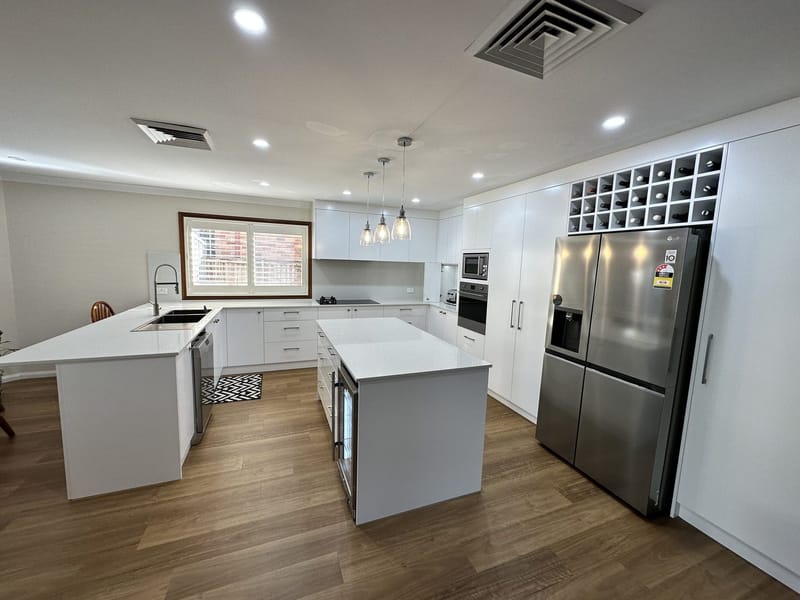 Kitchen remodel with smart storage and stone benchtop — ASP Build & Co