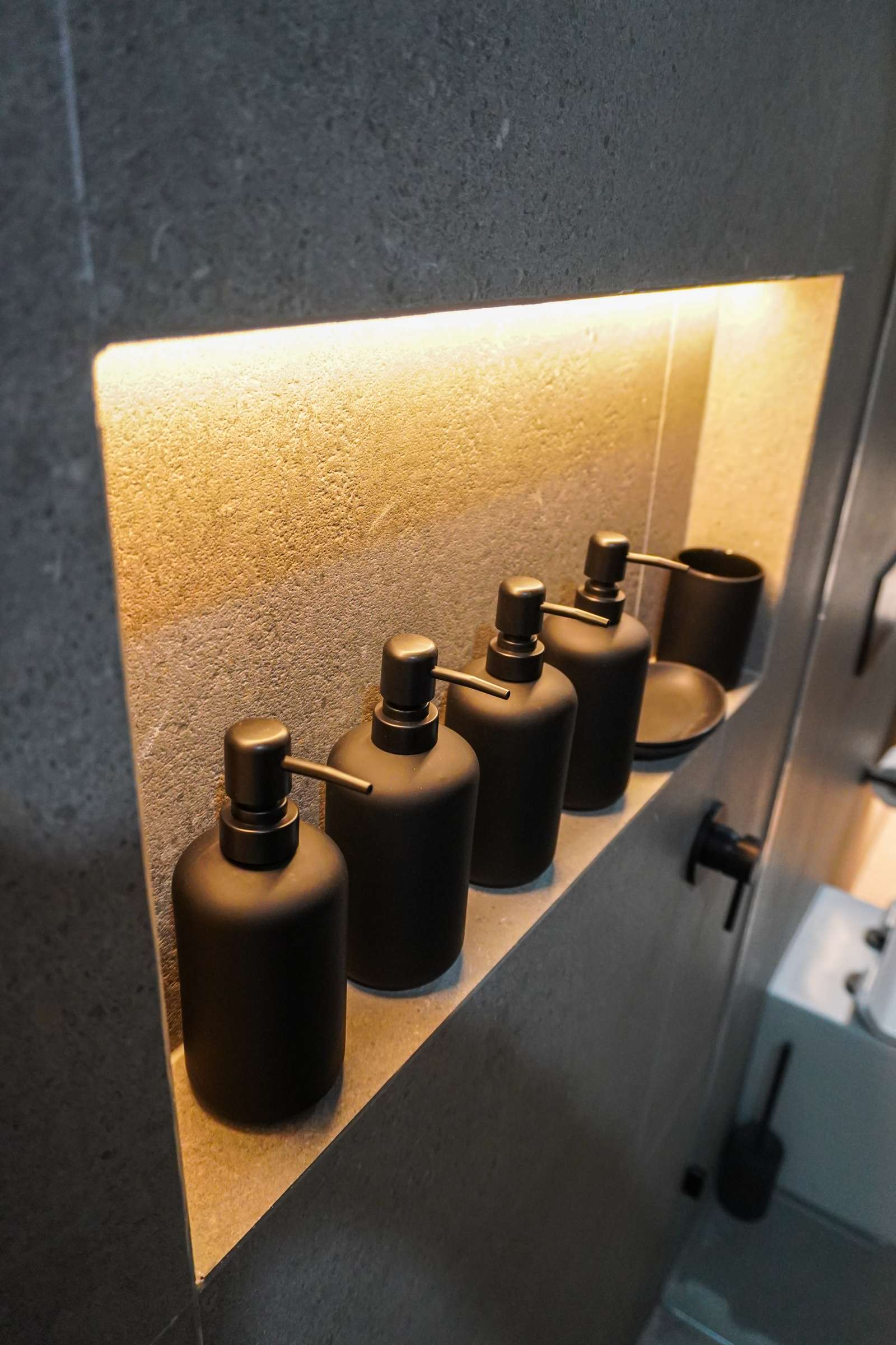 LED-lit shower niche detail in a renovated Kingswood bathroom